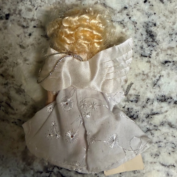 Porcelain Angel Doll with Golden Hair and Iridescent Wings - Picture 2 of 6